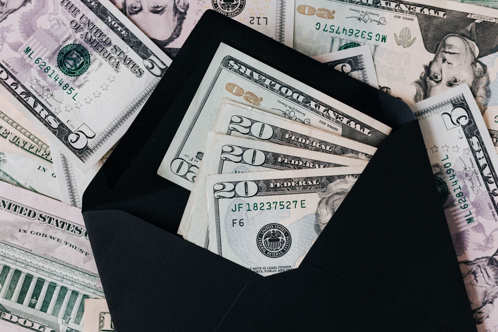 Planning an app budget with notes and a calculator on the desk
