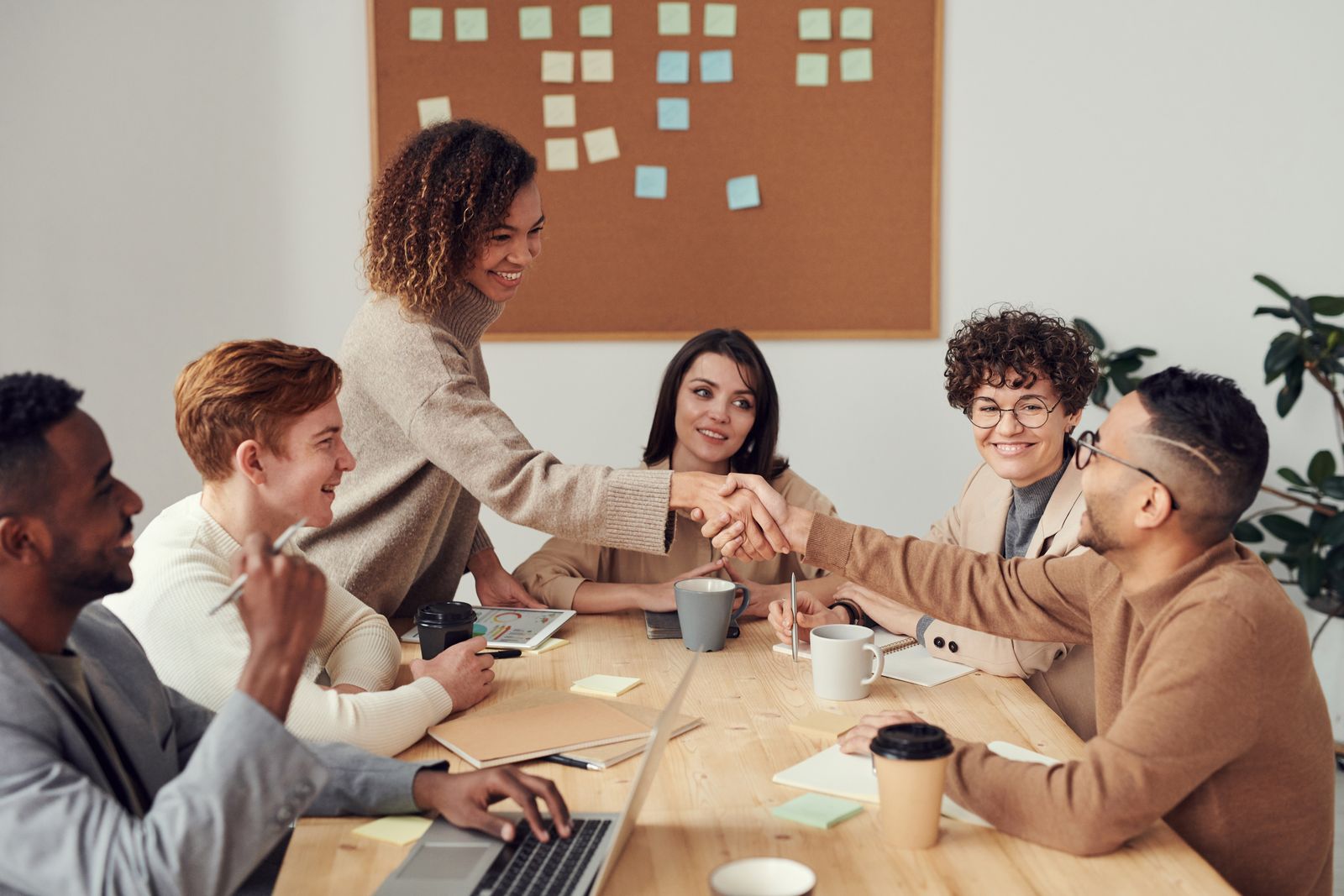 Team reviewing a company website around a table