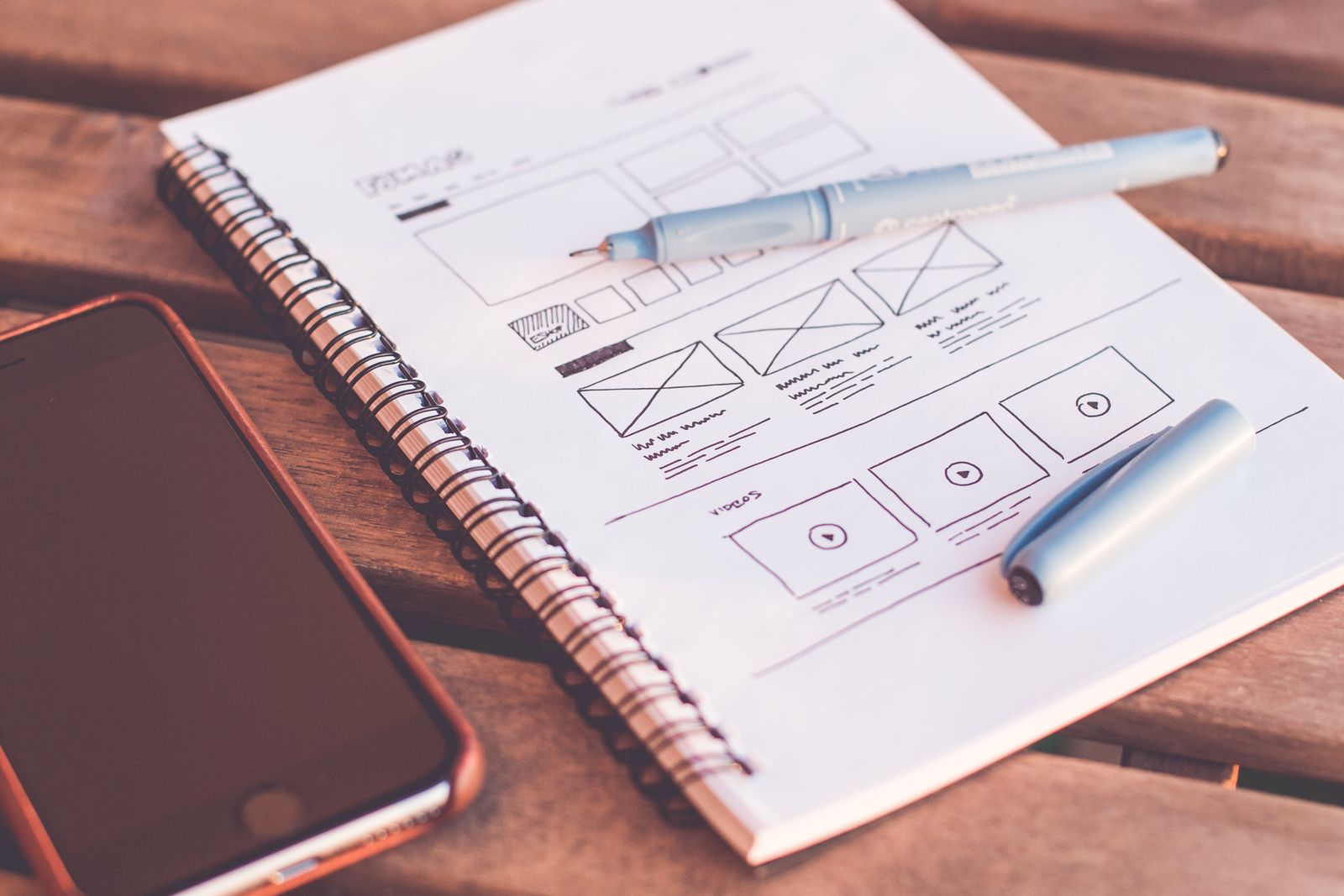 Design tools and sketches on a desk