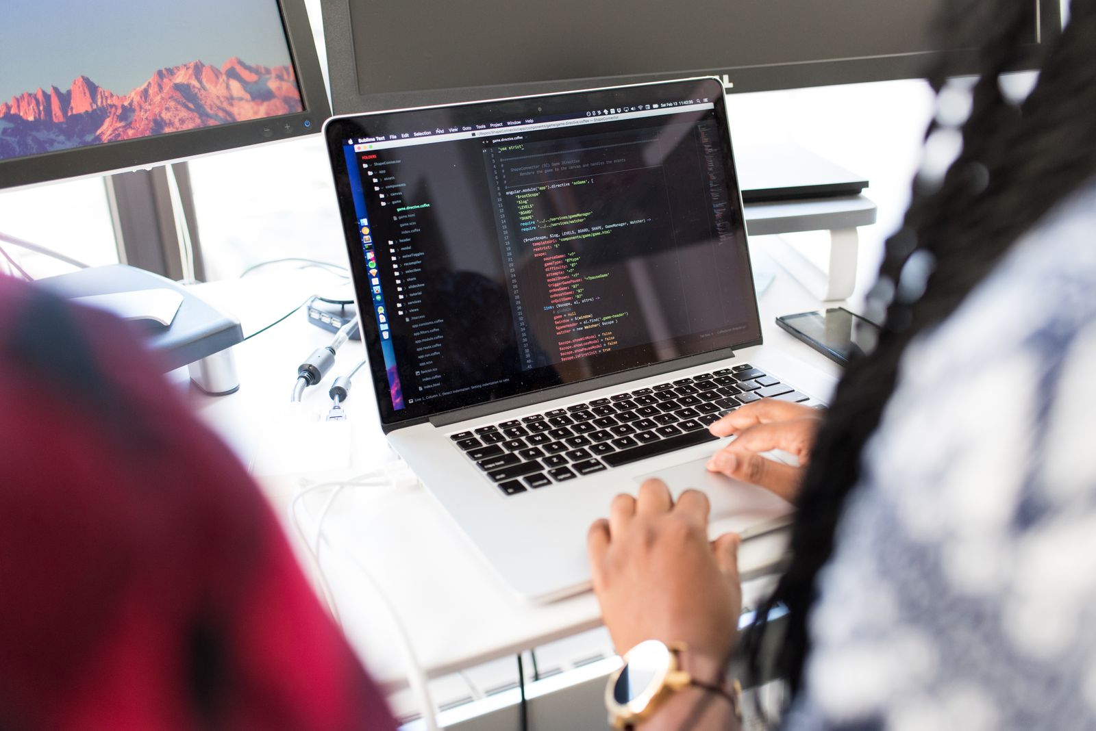 Product dashboard on a laptop — SaaS development with a named owner