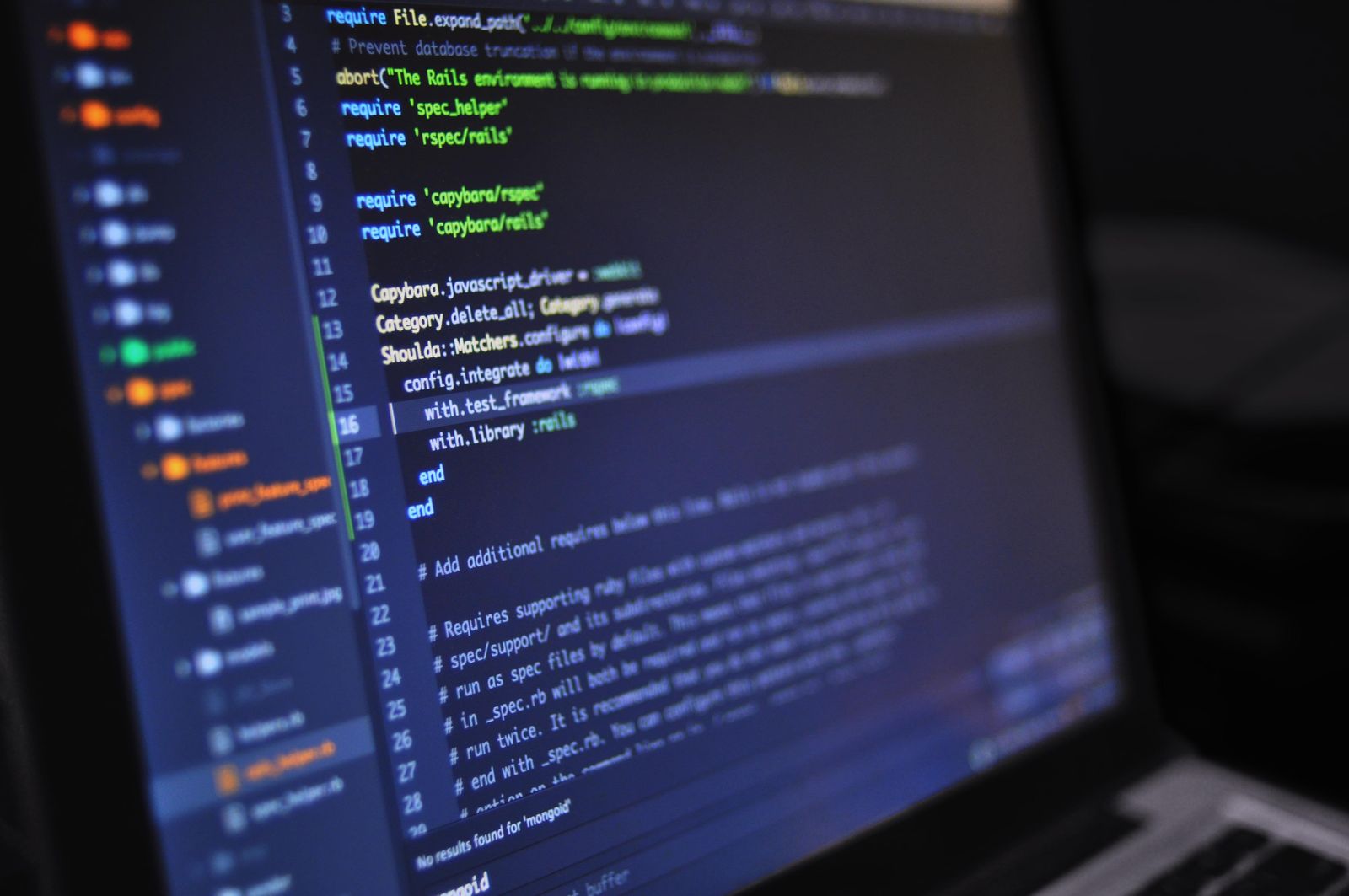 Laptop showing code during a software handover
